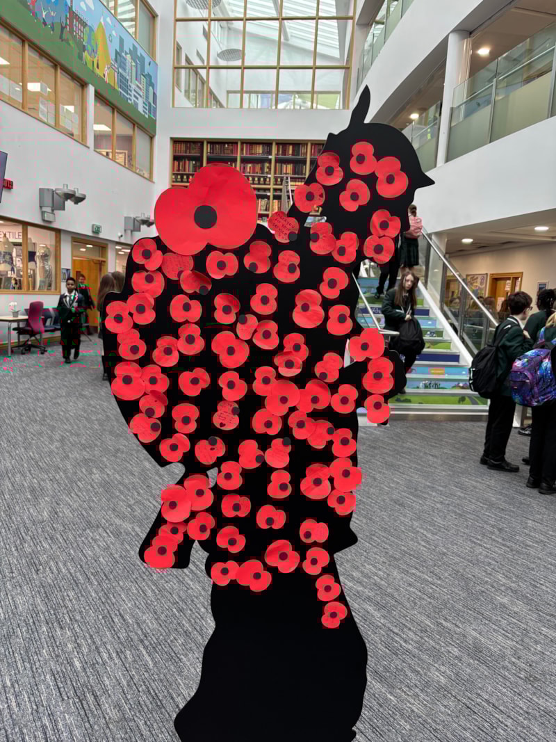 Stockport Academy Marks Remembrance with Poppy Drop Tribute